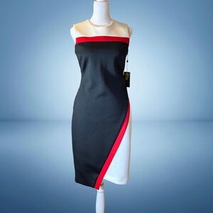 Never worn Tommy Hilfiger Asymmetrical Black
Dress with Red and White New Size 2